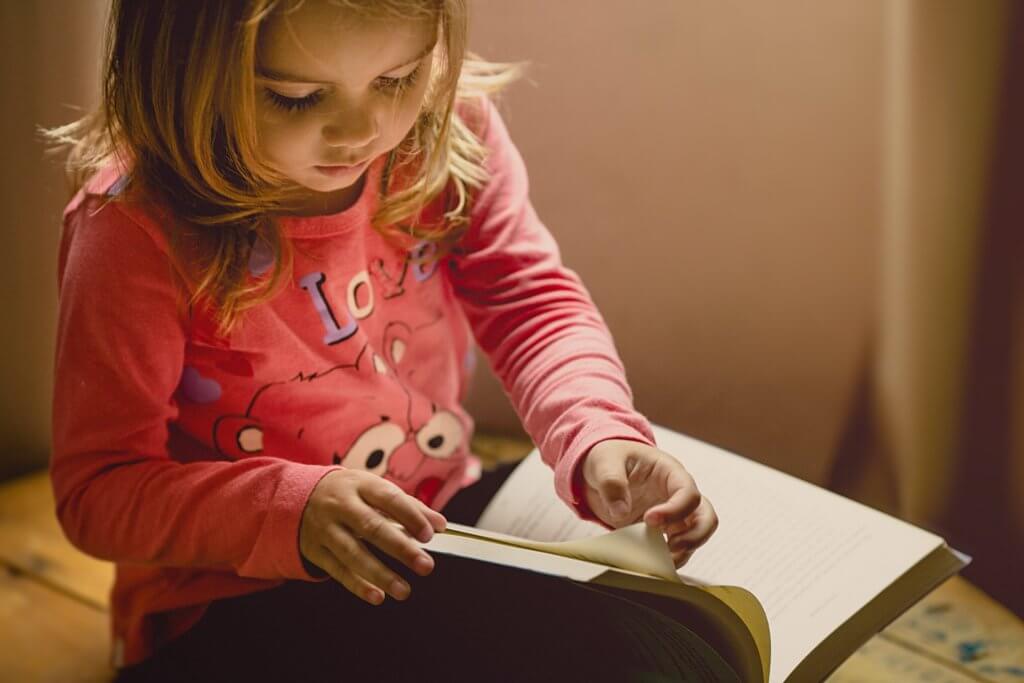 Little Girl reading book